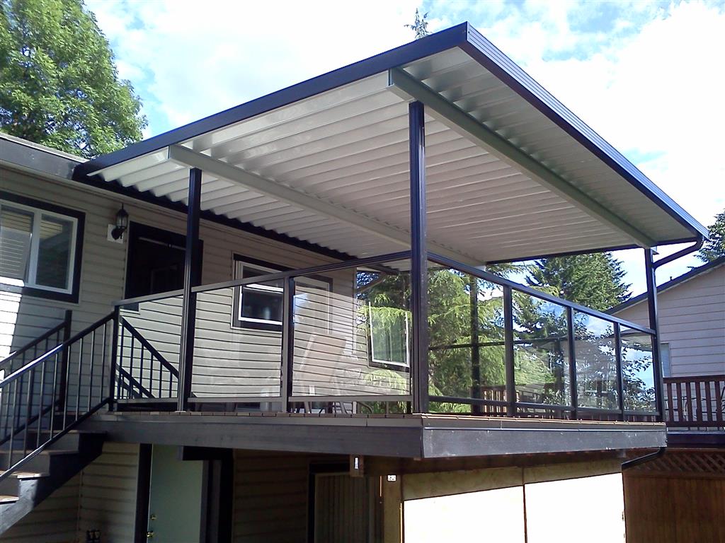 Aluminum canopy no skylights with white panels, black trim, and black posts.