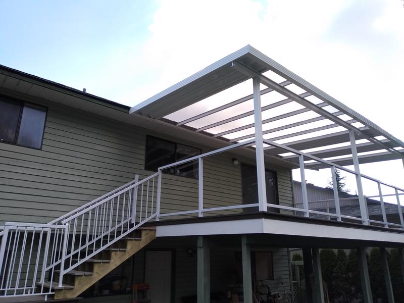 Glass railings with white trim.